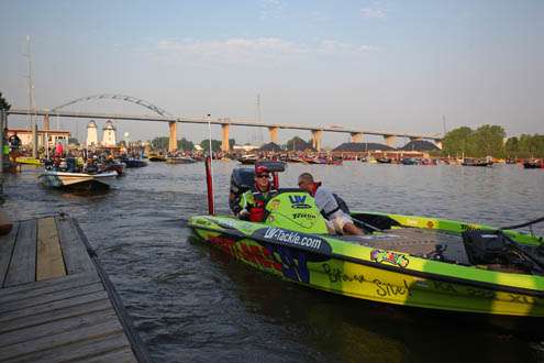 <p>
	Current Toyota Tundra Bassmaster Angler of the Year points leader Brent Chapman motors pass the dock.</p>
