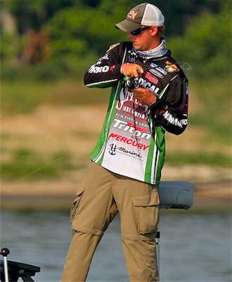 <p>
	After a couple casts to the fish, VanDam hooks up.</p>
