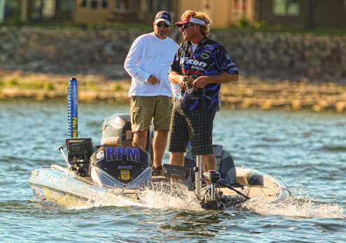 <p>
	Rick Morris rides the waves on Day Three in Little Sturgeon Bay.</p>
