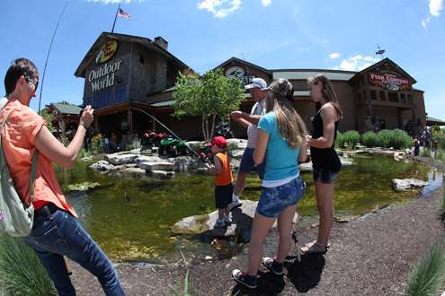 <p>
	Bass Pro Shops' pond is full of fish today!</p>
