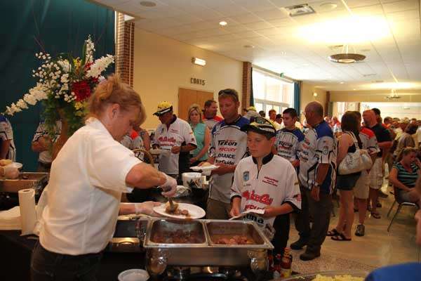 <p>
	Young Arkansas competitor Clayton Robbins claims his share of dinner.</p>
