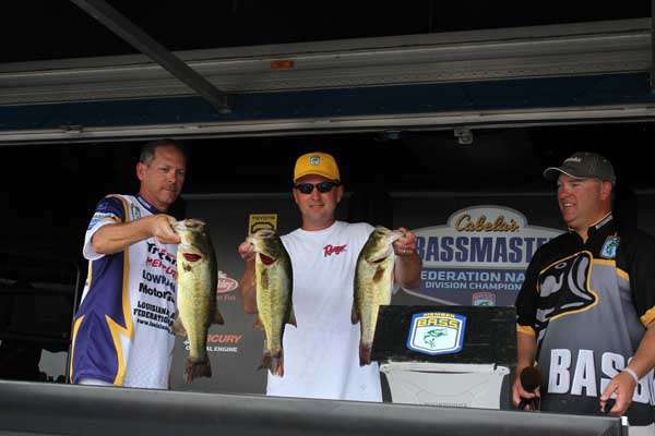 <p>
	Jared Knuth from Nebraska has good reason to smile. These three bass were part of a five fish bag that put him in second place. He currently stands 10 ounces behind the leader, Dale Hightower (Oklahoma).</p>
