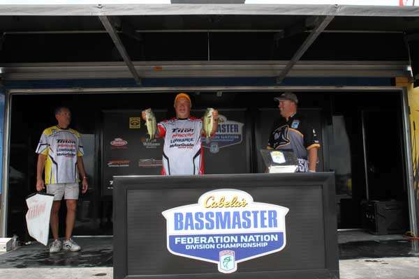<p>
	Greg Cooper is leading his fellow Mississippi anglers with a total weight of 18 pounds, 8 ounces. And, he looks like heâs having a good time, too.</p>
