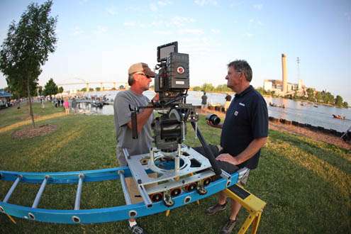 <p>
	Wes Miller and Tommy Sanders set up equipment for an early morning video shoot.</p>
