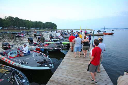 <p>
	The boat check dock fills with family and friends as the competitors idle out on Day Two.</p>
