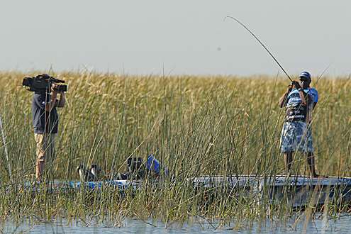 <p>
	Ish Monroe hooks a kicker fish at Lake Okeechobee.</p>
