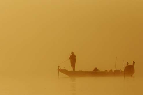 <p>
	Bill Lowen in a morning fog on St. Johns River.</p>
