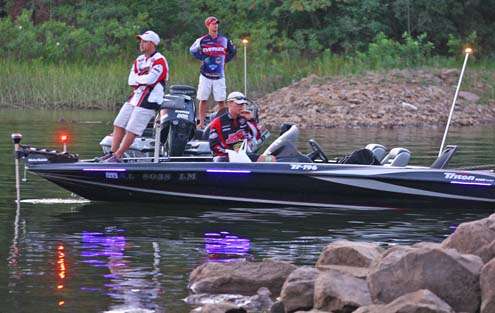 <p>
	Prior to the take off, collegiate anglers wait for the morning to start.</p>
