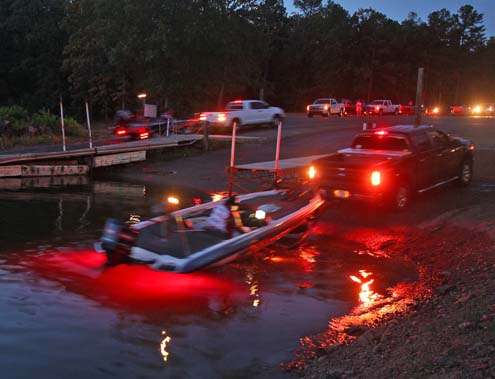 <p>
	An eerie red glow is cast by tail lights and trailer lights as boats are launched.</p>
