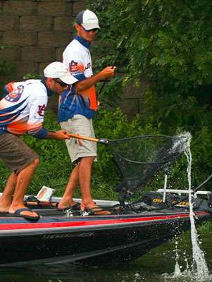 With a quick sweep, Matt Lee secures the bass into the net. 
