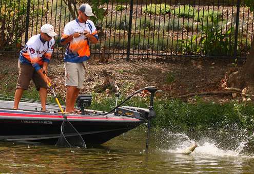 The team from Auburn battles another fish. 
