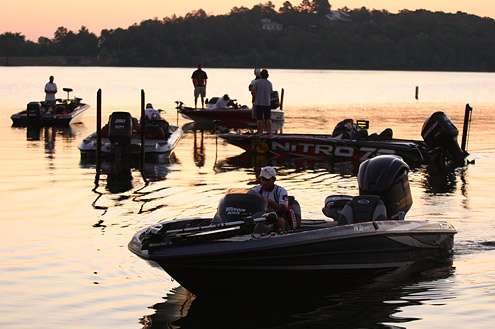 <p>
	Anglers gather around the launch area and make final preparations.</p>

