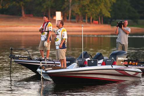<p>
	Hats are removed as the national anthem booms across Beaverfork Lake.</p>
