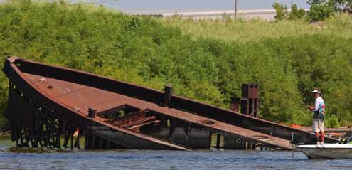 <p>
	Bernie Schultz works a large piece of structure on the Fox River -- an old wreck.</p>
