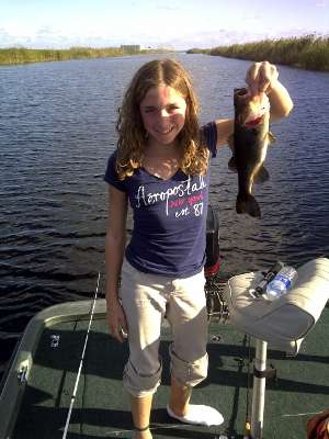 <p>
	Taylor, 12, catches a bass from Floridaâs Arthur Marshall Wildlife Refuge.</p>
