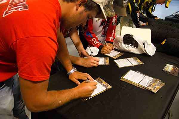 <p>
	Anglers sign up for giveaway prizes for Bass Pro Shops.</p>
