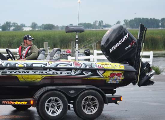 Elite Series pro Derek Remitz watches as his co-angler backs his rig down the ramp at Lake St. Clair Metropark.
