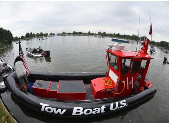 A BoatUS towboat is a welcome presence at Bass Pro Shops Bassmaster Opens. This one led the field out this morning.