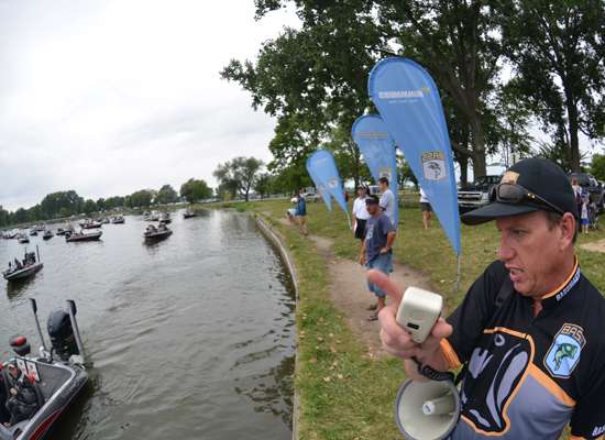Tournament Director Chris Bowes points an angler toward the inspection station.
