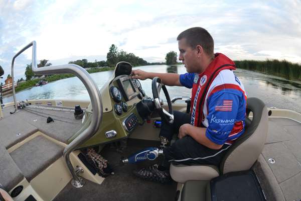 <p>
	Draughn checks his waypoints before heading out on the Detroit River/Lake St. Clair for the 2012 Bass Pro Shops Northern Open #2.</p>