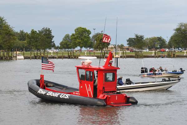 <p>
	Once again, a Tow BoatUS rig prepares to lead the launch out of the cove.</p>
