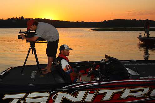 <p>
	Cameraman Justin Darling sets up to capture today's event on Beaverfork Lake.</p>
