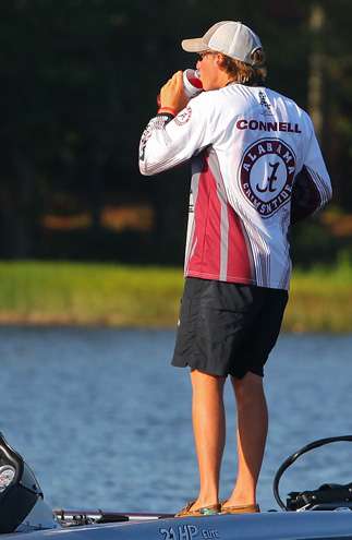 <p>
	Connell stops fishing to grab a quick drink. Todayâs high temperature is forecasted to be 104 degrees.</p>
