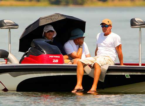 <p>
	Michael Middleton, Tommy Sanders and Matt Lea, try to stay cool while observing the afternoon competition. </p>
