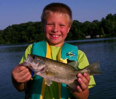 <p>
	Alex, 8, caught  this bass on a 7-inch worm.</p>
