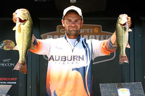 <p>
	Matt Lee shows off two of the fish that helped him into Round 2.</p>

