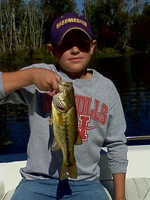 <p>
	Cameron, 12, holds his first bass. Nice hat, Cameron!</p>
