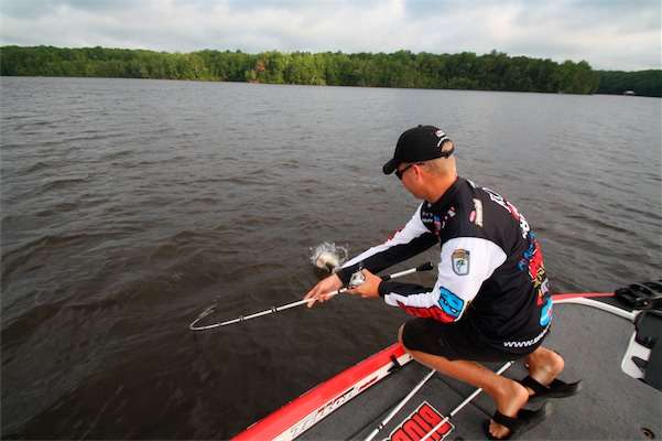 <p>
	<strong>7:25 a.m</strong>. Roy has the bass in his sight now, struggling to bring it to the boat.</p>
