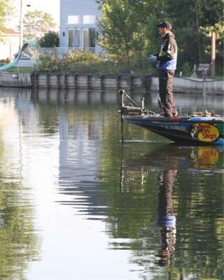<p>
	 </p>
<p>
	DeFoeâs reflection is cast down the canal as he works the area.</p>
