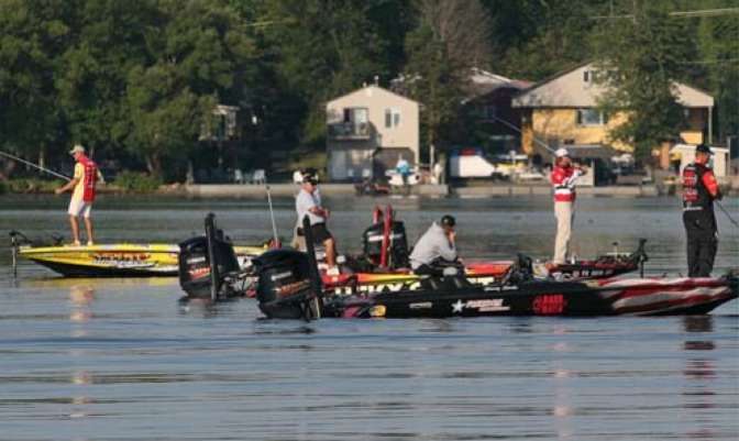 <p>
	 </p>
<p>
	A group of anglers, Kelly Jordon, Jeremy Starks and Boyd Duckett, pile together in one area of the lake.</p>
