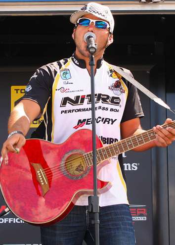 Northern Open competitor Brian Schram performs before the final weigh-in at Bass Pro Shops in Auburn, New York.