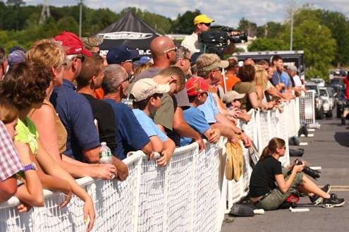 Spectators lined the fence to enjoy the final day drive-thru weigh-in.
