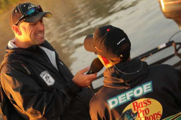 <p>
	 </p>
<p>
	B.A.S.S. emcee Dave Mercer conducts an interview with Ott DeFoe about the Angler of the Year race. DeFoe currently sits in second place behind Brent Chapman.</p>
