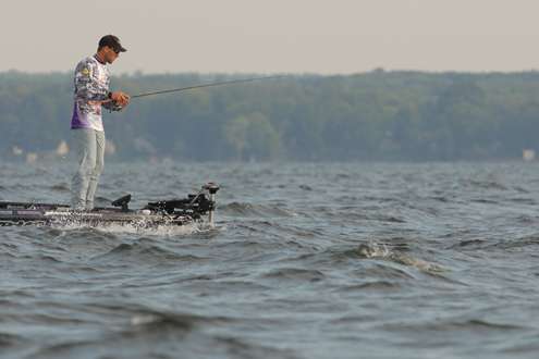 <p>
	Aaron Martens fights the waves as he waits to bring in a keeper.</p>
