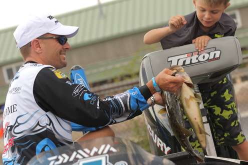 <p>Randy Howell shows off his fish.</p>
