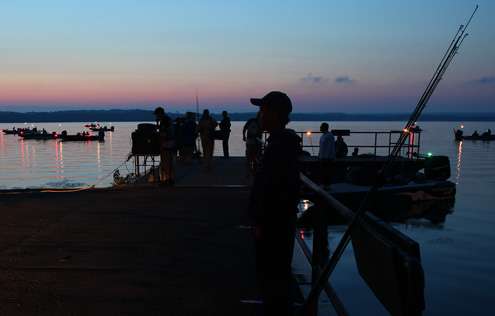 Co-anglers gather on the launch dock at Cayuga Lake State Park to be paired with their Day One pros. 