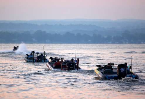 Boats take their hole shots and speed south on Cayuga Lake. 