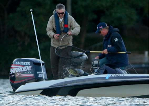<p>
	Tournament leader Pete Gluszek spent a considerable portion of his morning, netting fish for co-angler Paul Groney on Day Three at the Northern Open on Cayuga Lake. </p>
