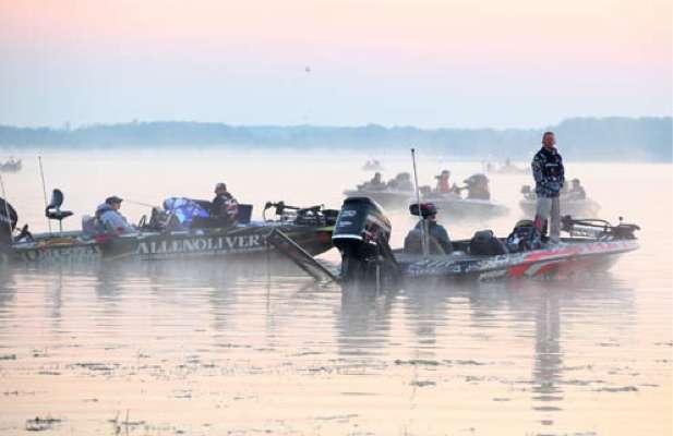 <p>
	 </p>
<p>
	A light fog lifts off the water as anglers arrive and wait for the morningâs take-off.</p>
