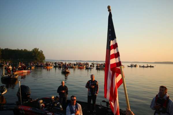 <p>
	Anglers remove their hats and pay respect while the National Anthem plays.</p>
