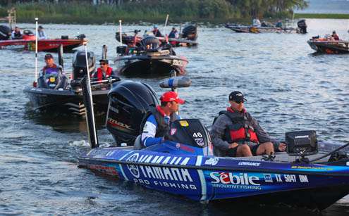 <p>
	Todd Faircloth and company slowly idle by as they head out to the windy open water.</p>
