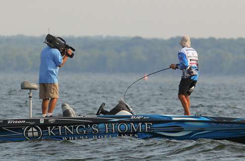 <p>
	Howell hooks up with his first keeper fish of the day.</p>

