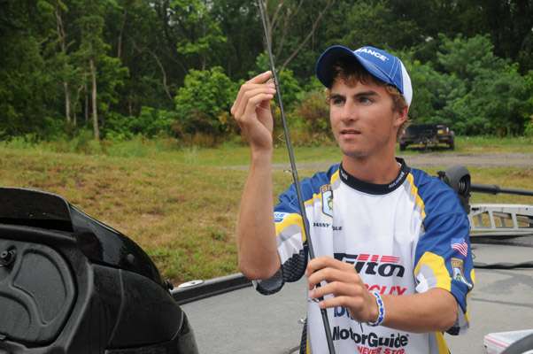 Michigan teen Danny Sprague gets his rods ready for the Junior Bassmasters competition of the Northern Divisional.