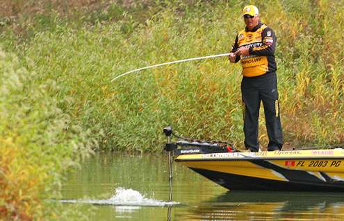 <p>
	 </p>
<p>
	Terry Scroggins sets the hook on a fish in the early minutes of Day Two.</p>
