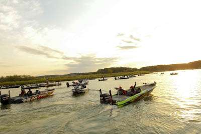<p>
	Current Toyota Tundra Bassmaster Angler of the Year Brent Chapman heads out onto the water.</p>
