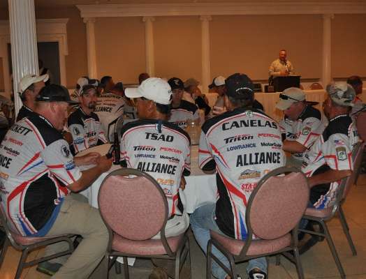 Anglers listen during the briefing at registration.